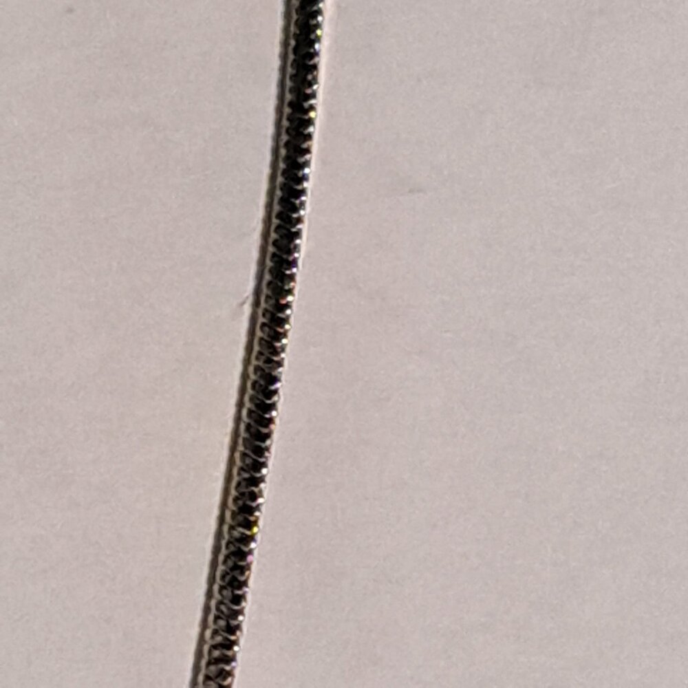 hinged pendant that opens to hold anything you want on a silver color chain - Picture 4 of 4